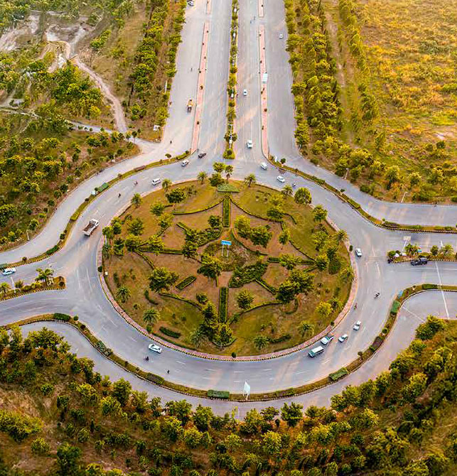 Aerial view of the Gulberg Islamabad roundabout surrounded by landscaped greenery